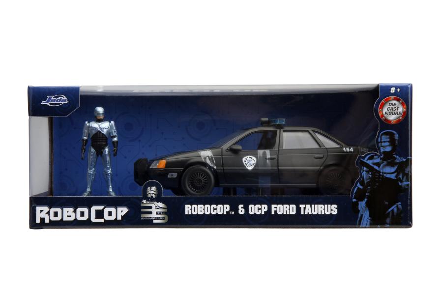 Carro Ford Taurus 1986 con Figura Robocop Esc:1:24 8a+